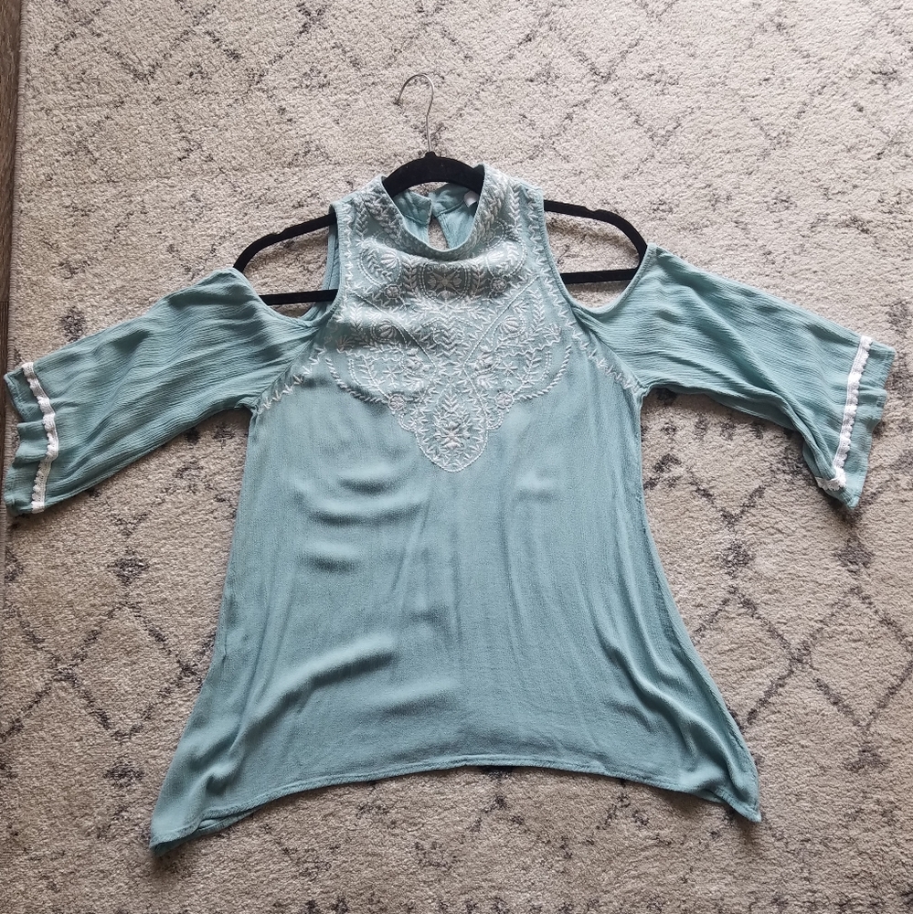 Teal blouse from Charming Charlie's